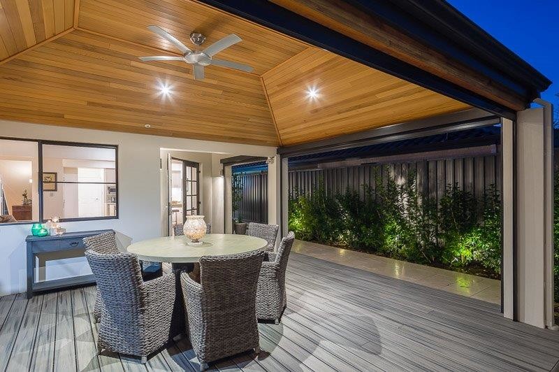Design ideas for a contemporary backyard verandah in Perth with decking.