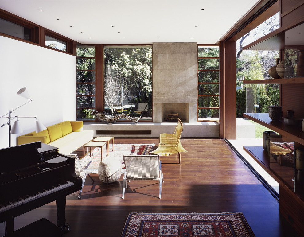 Photo of a modern living room in San Francisco with a music area and a standard fireplace.