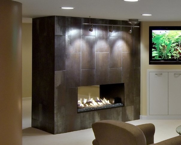 Inspiration for a mid-sized contemporary walk-out basement in Minneapolis with beige walls, carpet, a ribbon fireplace and a tile fireplace surround.