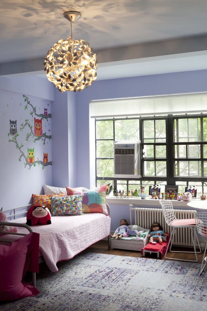 Inspiration for a contemporary kids' room in New York with purple walls.