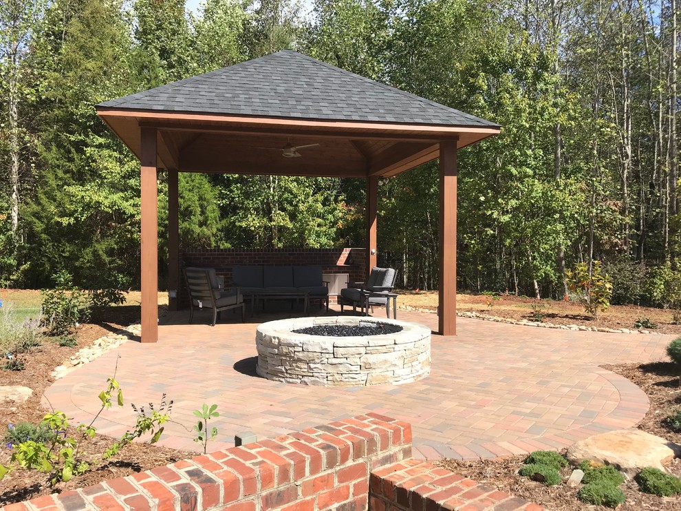Large patio with gas fire pit and pavilion - Traditional ...