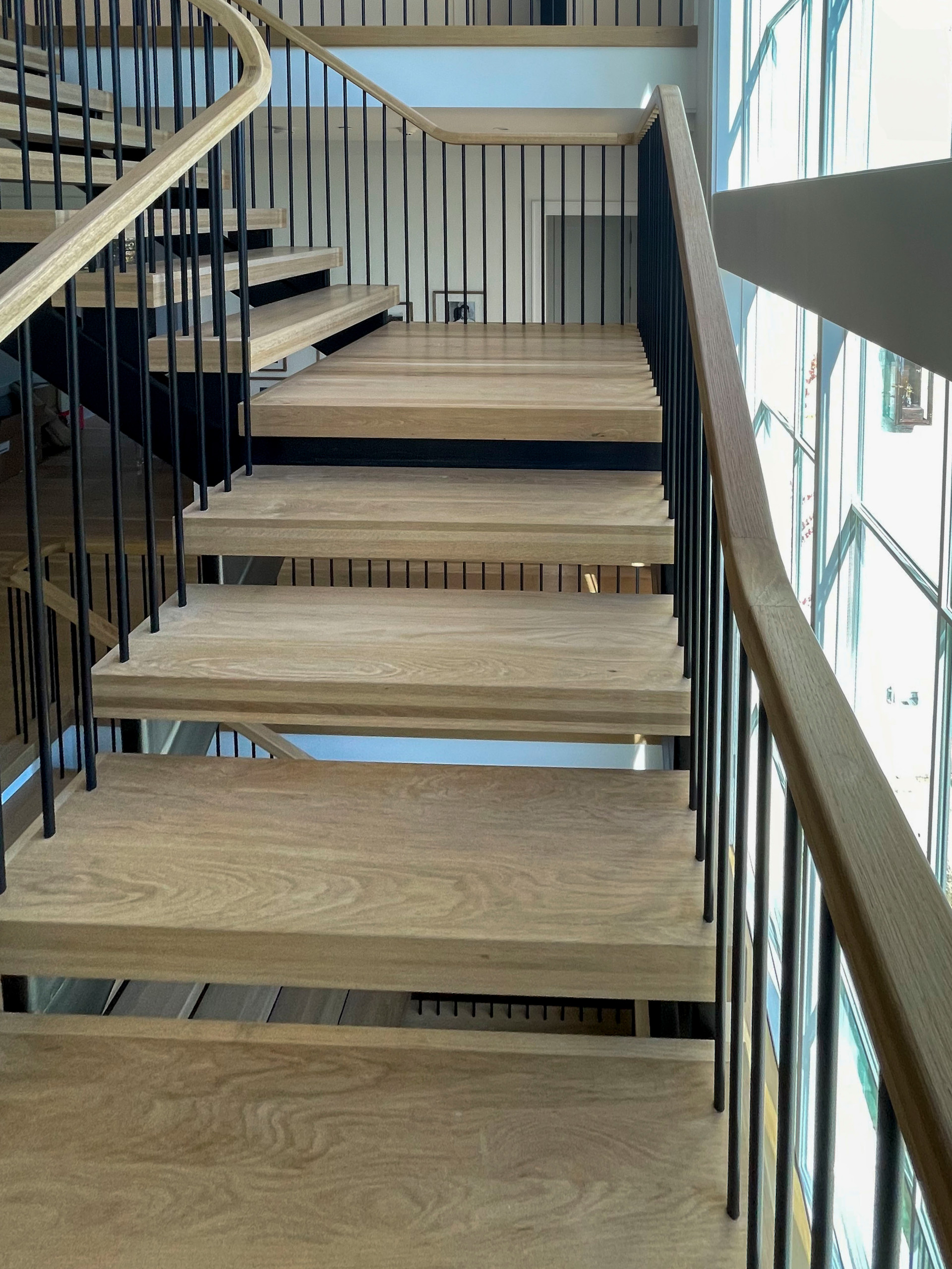 96_Dramatic cantilevered no-riser staircase, Bethesda, MD 20814