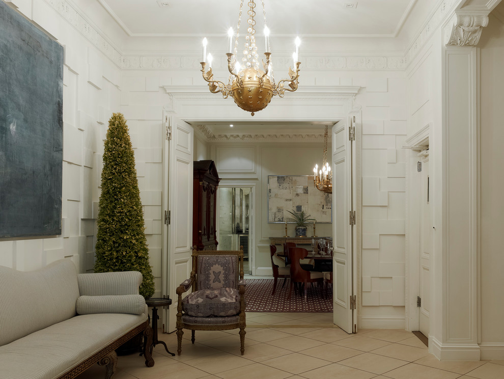 Foyer - large transitional foyer idea in New York with white walls and a black front door