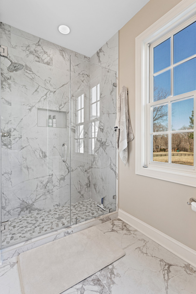 Freestanding bathtub - traditional marble tile freestanding bathtub idea in DC Metro with beaded inset cabinets, white cabinets, quartz countertops and a hinged shower door