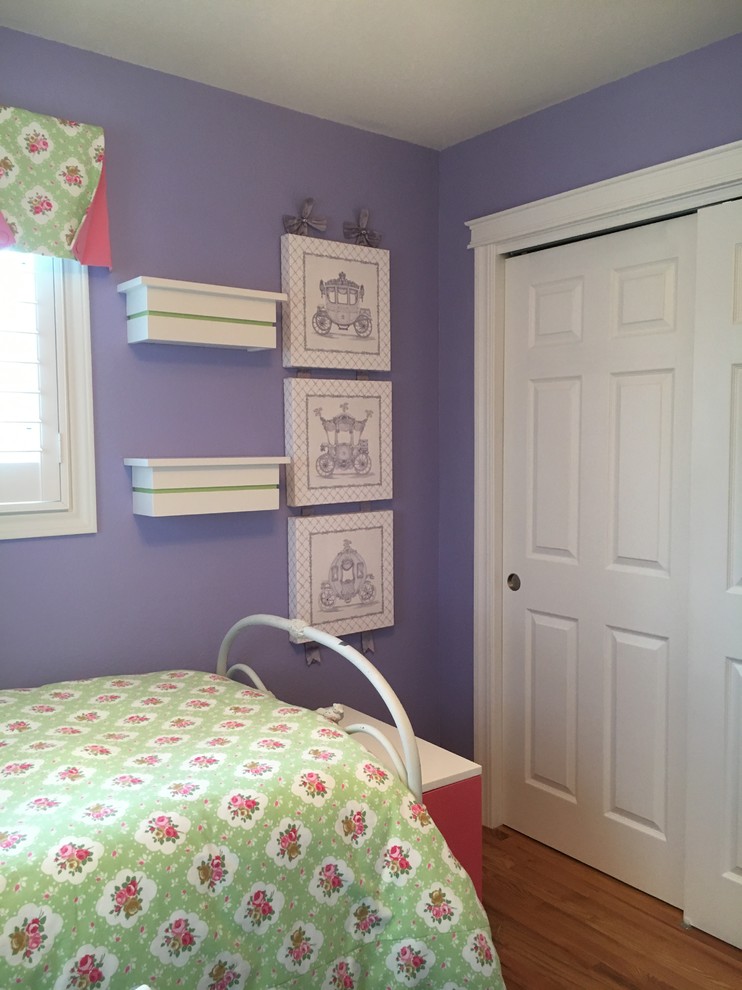 Design ideas for a small traditional kids' room for girls in Denver with purple walls and dark hardwood floors.