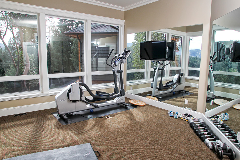 This is an example of a mid-sized modern multipurpose gym in Vancouver with carpet.