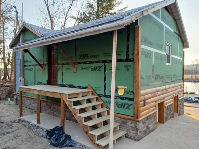 Log Siding, Stamped Concrete and Post and Beam Carport