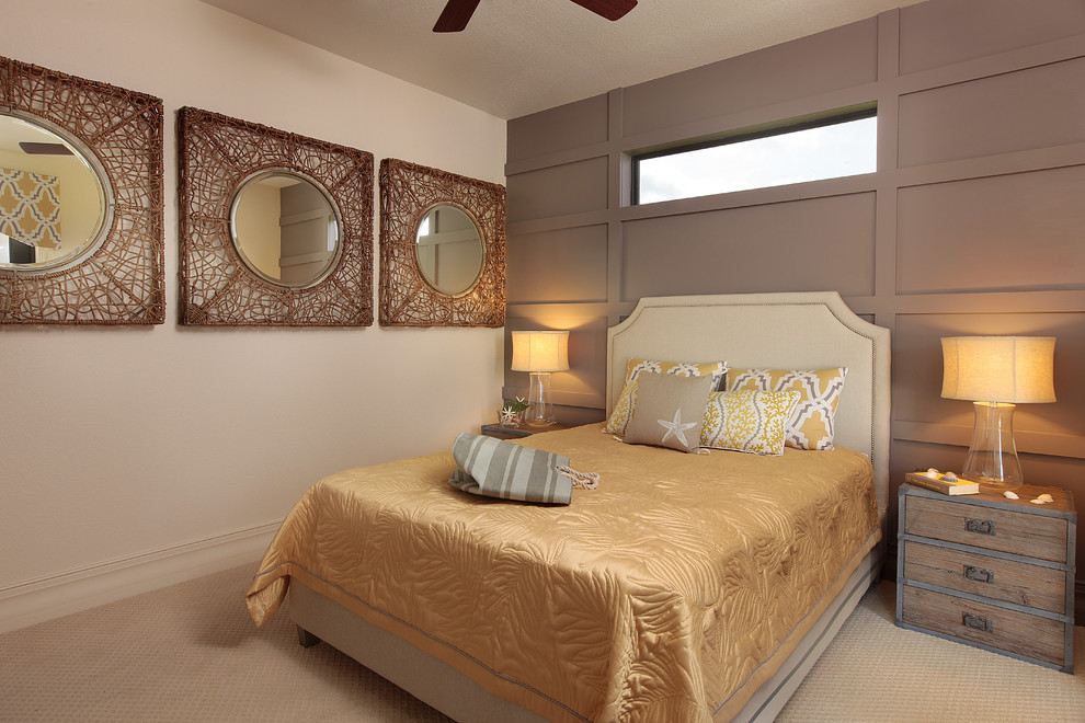 This is an example of a mid-sized tropical guest bedroom in Tampa with beige walls, carpet, no fireplace and beige floor.