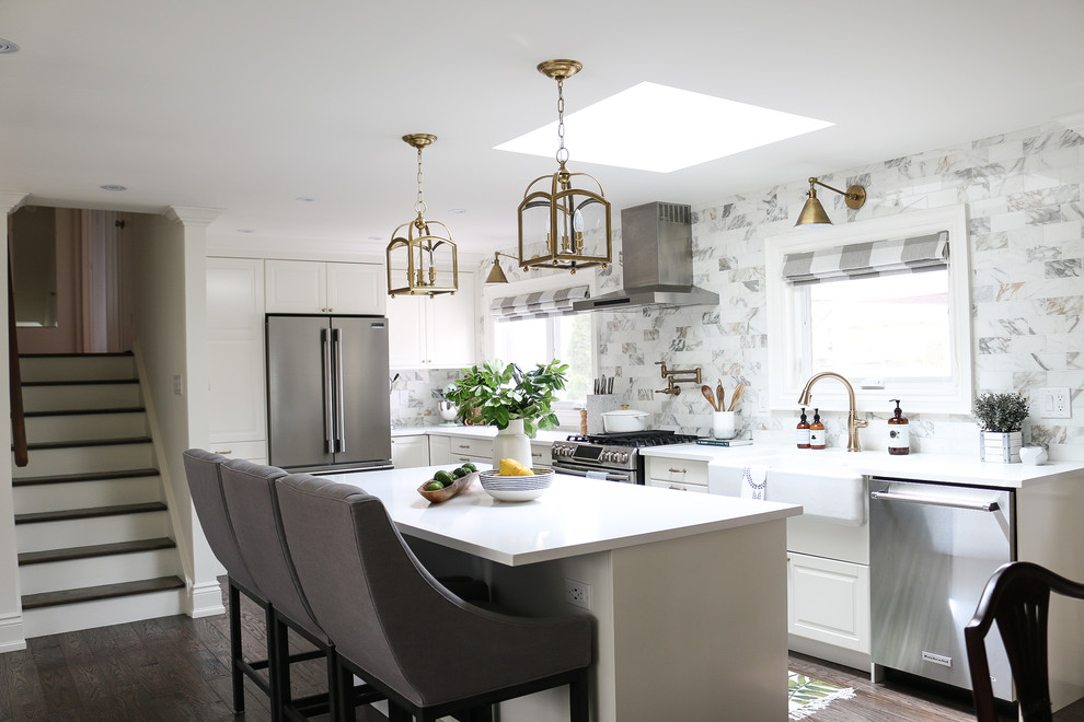 Example of a transitional kitchen design in Toronto