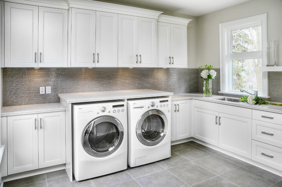 Inspiration for a contemporary laundry room in Toronto with grey walls.
