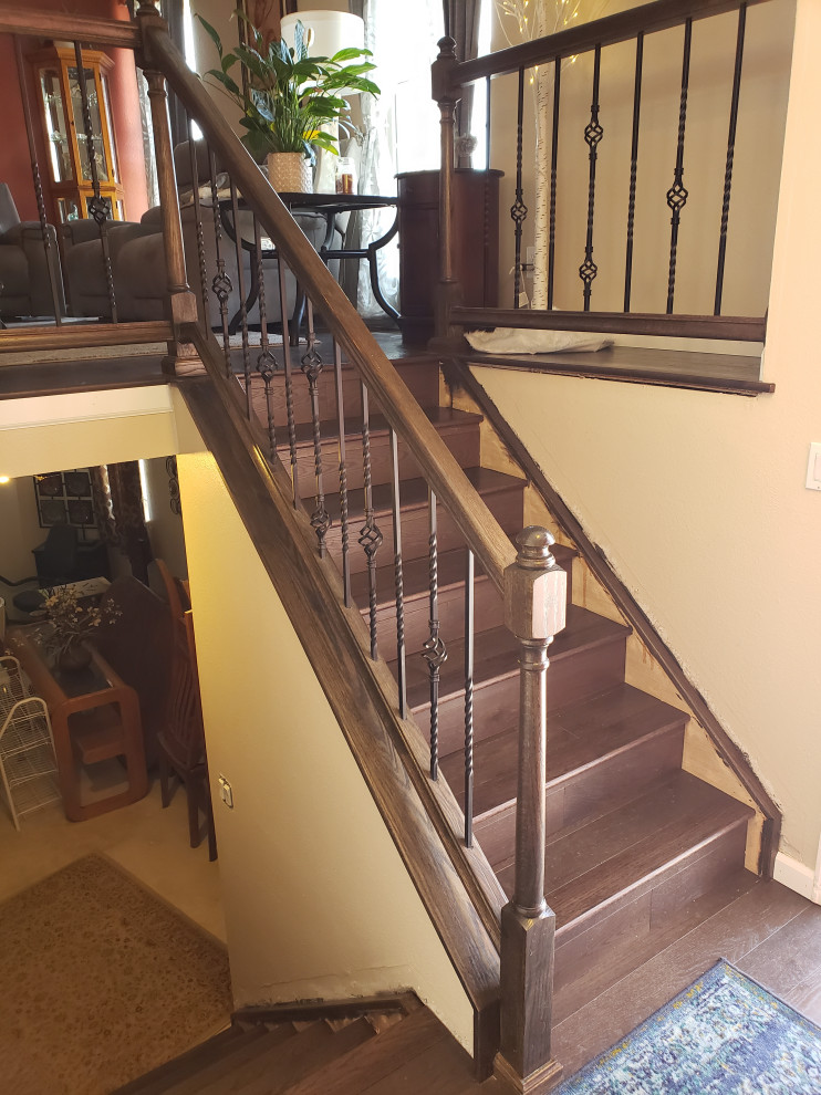Classic Iron Balusters & Dark Wood Staircase Transformation