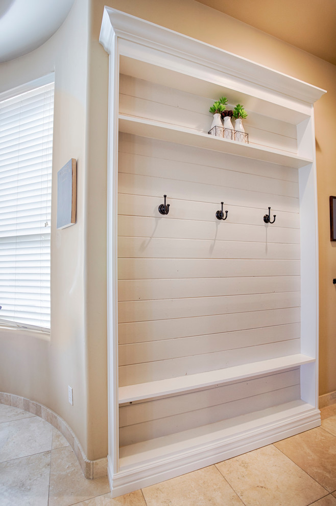 Example of a small transitional hallway design in Phoenix with beige walls