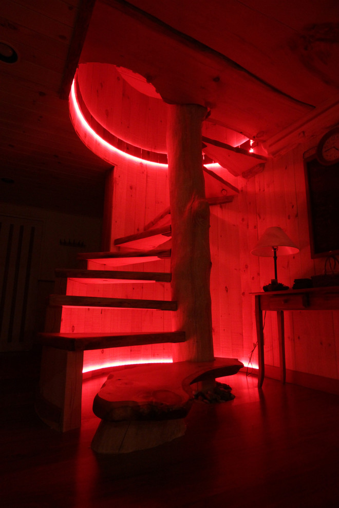 Mid-sized mountain style wooden straight open and wood railing staircase photo in Burlington