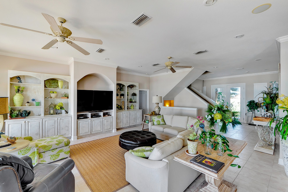 Design ideas for a beach style family room in Miami.