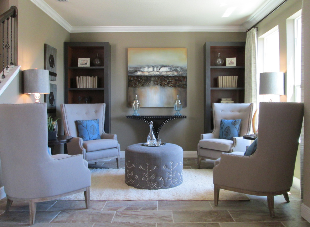 Design ideas for a transitional living room in Orlando with a library, beige walls, ceramic floors, beige floor and coffered.