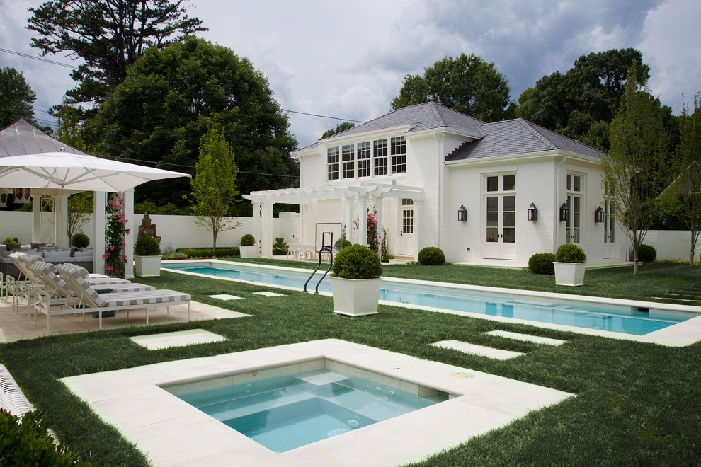This is an example of a midcentury pool in Raleigh.