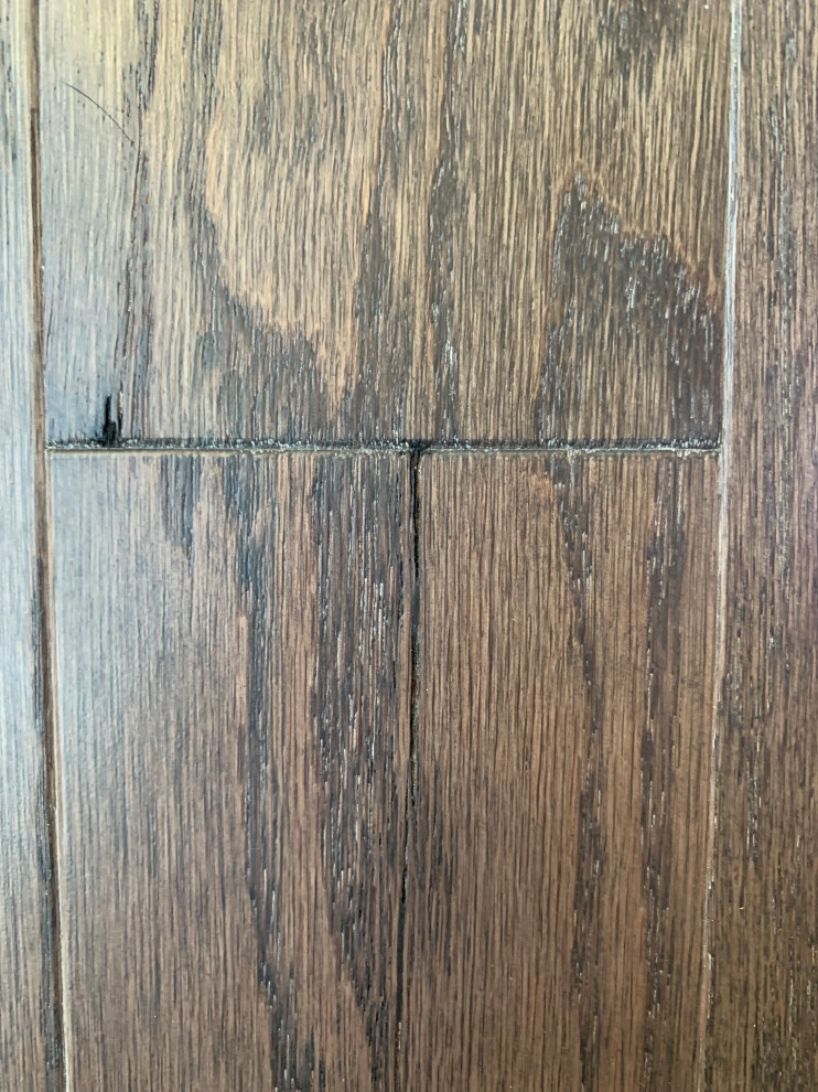 Brandnew hardwood floor with cracks