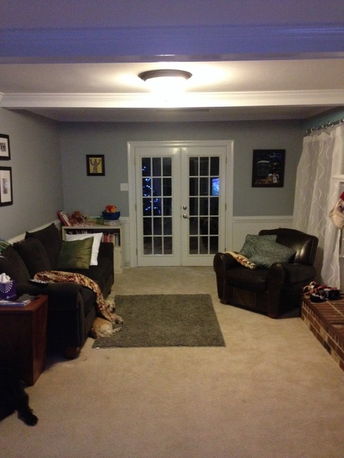 How should I arrange our odd shaped living room?