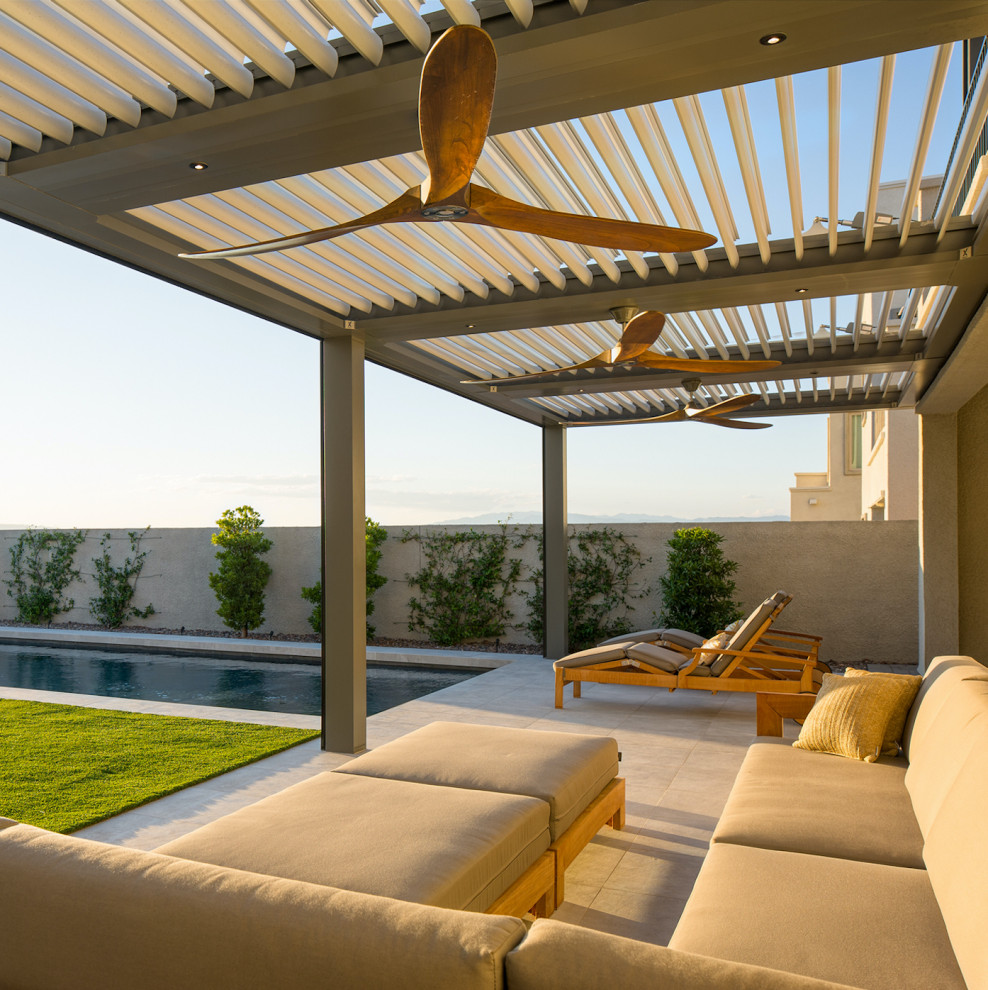 Patio - mid-sized contemporary backyard patio idea in Phoenix with a pergola