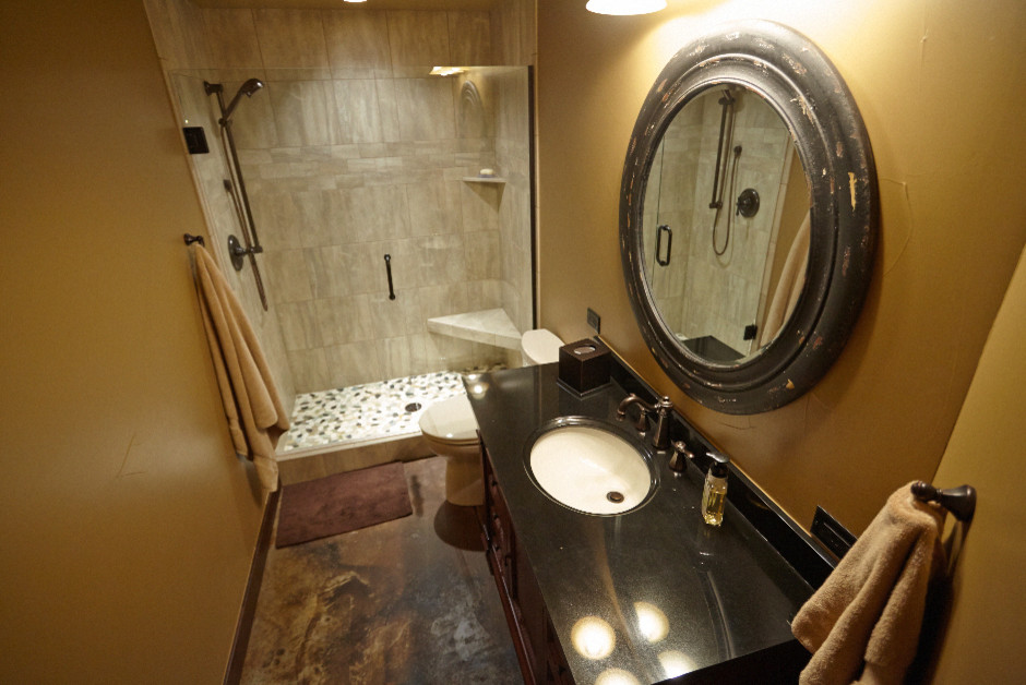Irish Pub Basement Finish Traditional Bathroom Denver by