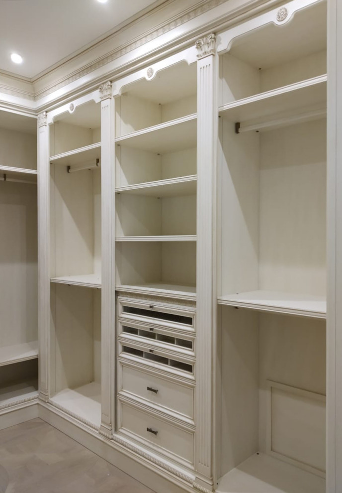 Inspiration for a mid-sized transitional women's storage and wardrobe in Moscow with open cabinets, light wood cabinets, light hardwood floors, beige floor and wood.