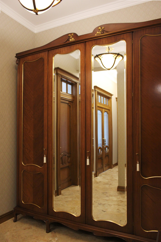 Photo of a large midcentury mudroom in Moscow with beige walls, travertine floors, beige floor, recessed and wallpaper.