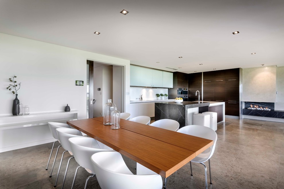 This is an example of a contemporary dining room in Perth with concrete floors.