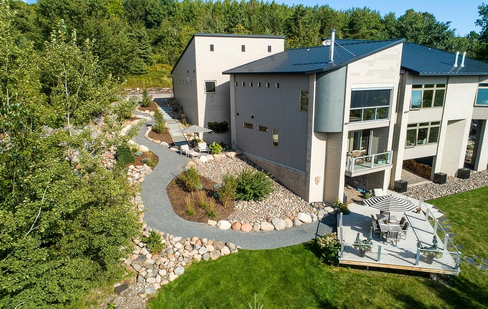 Inspiration for a modern hillside garden path.