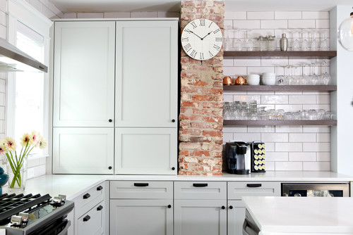 kitchen with exposed brick