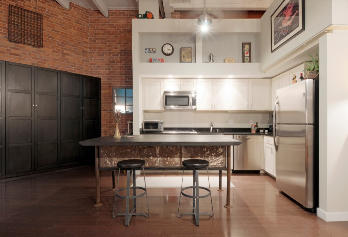 Industrial Farmhouse Kitchen Island with Reclaimed Wood and Vintage Accents