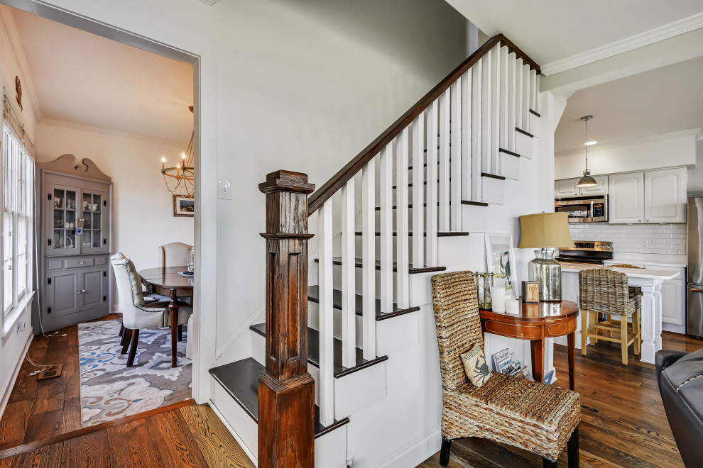 Inspiration for a small traditional wood straight wood railing staircase in Baltimore with wood risers.