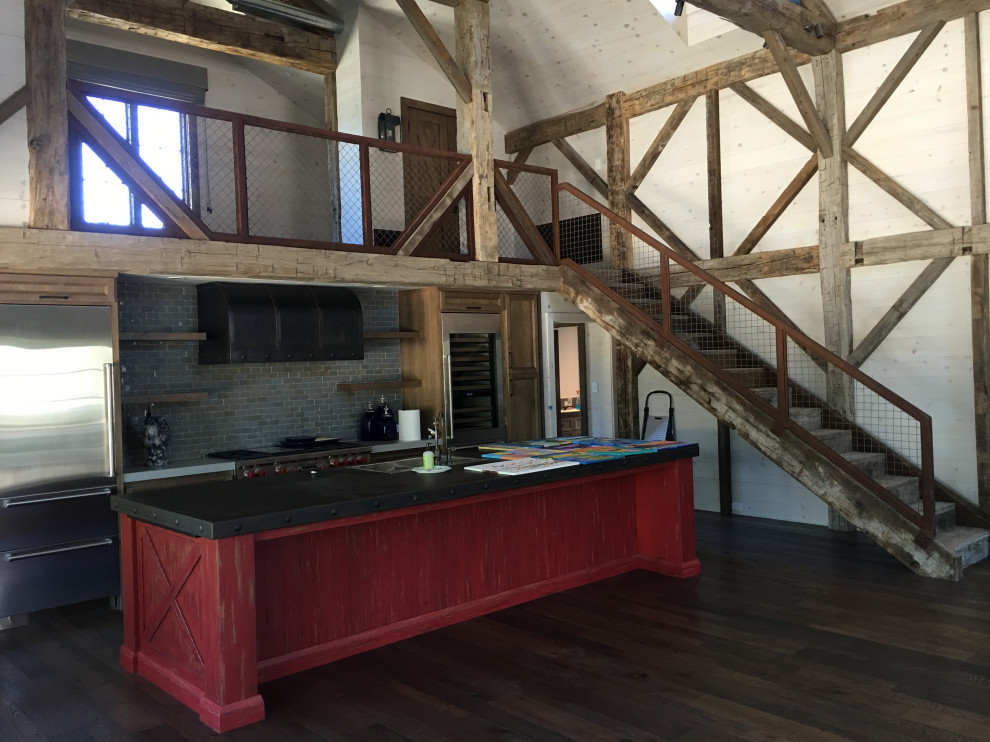 Staircase - rustic wooden straight metal railing staircase idea in Phoenix with wooden risers
