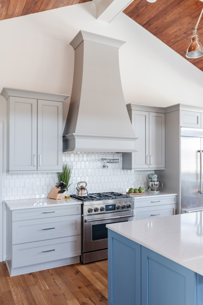 Kitchen - large transitional kitchen idea in Omaha with an island