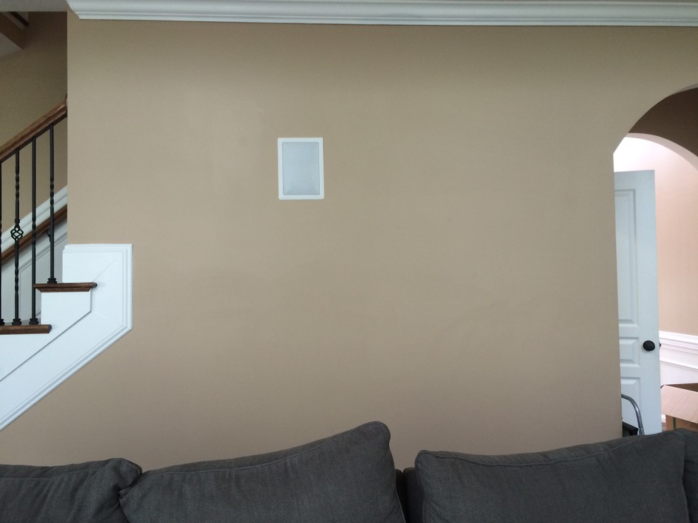 How to blend built in speakers with wall decor?
