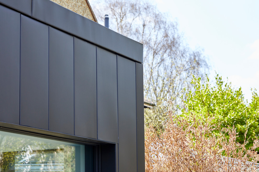 This is an example of a mid-sized contemporary exterior in Hertfordshire.
