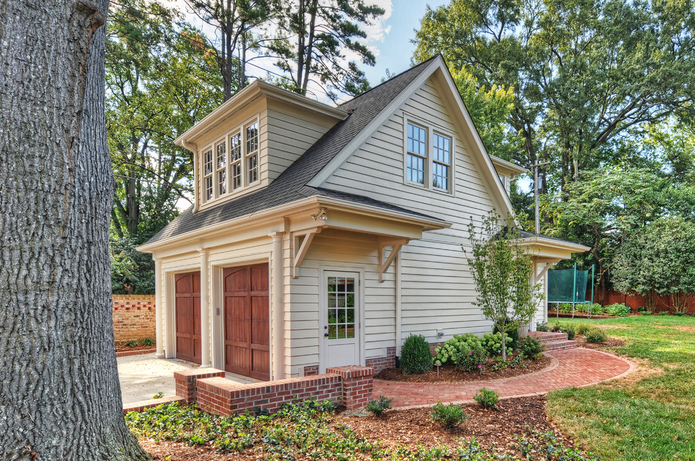 Inspiration for a mid-sized traditional detached two-car garage in Charlotte.