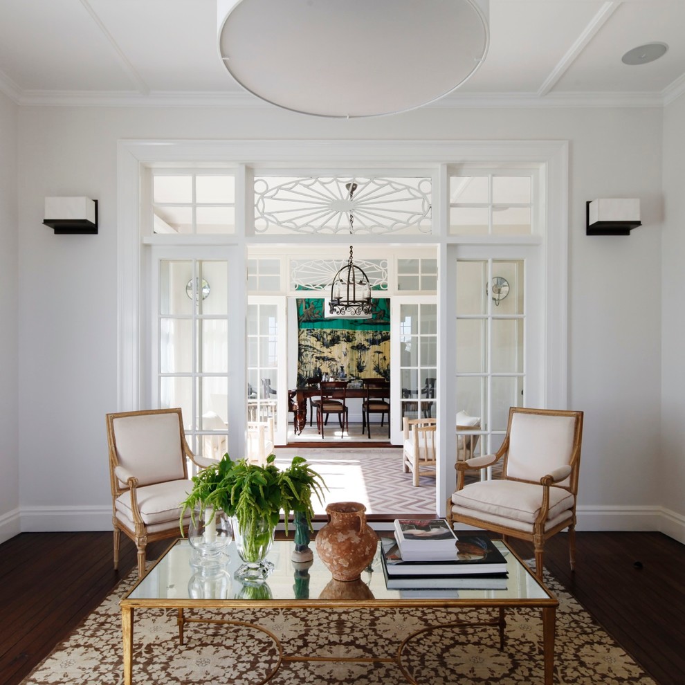 Inspiration for a large traditional living room in Sydney with white walls and dark hardwood floors.