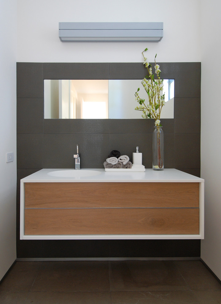 Design ideas for a modern bathroom in San Francisco with an integrated sink.