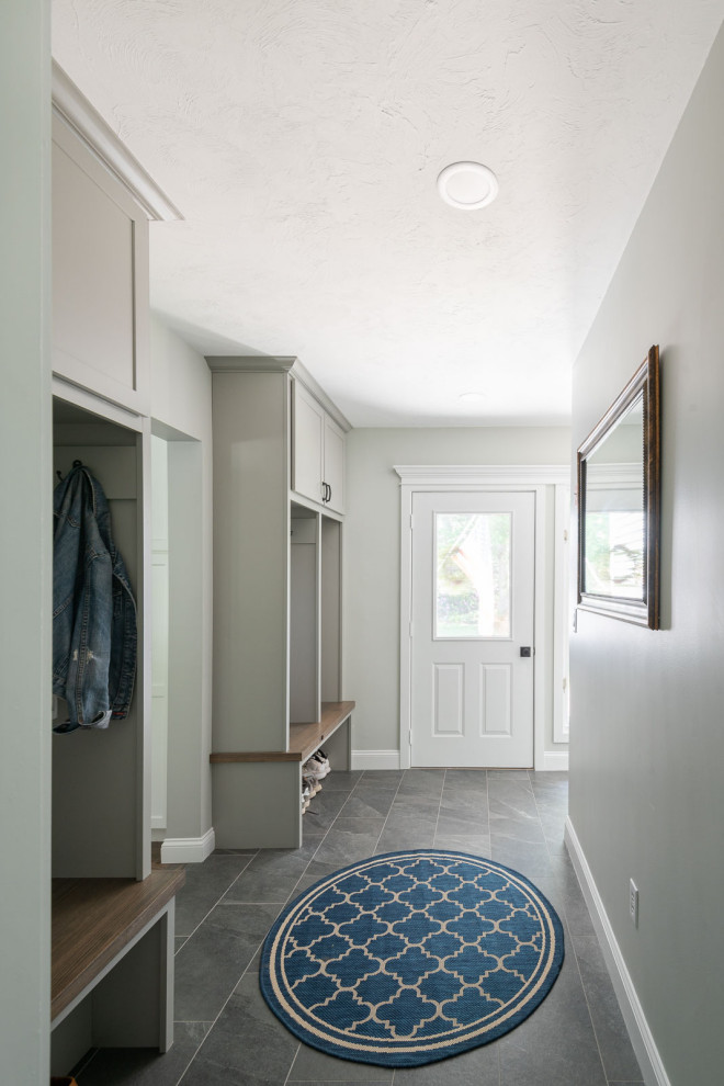 Mudroom - small transitional porcelain tile and gray floor mudroom idea in Boston with gray walls
