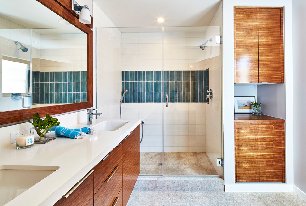 Inspiration for a transitional bathroom in Los Angeles with medium wood cabinets, an alcove shower, green tile, white tile and a vessel sink.