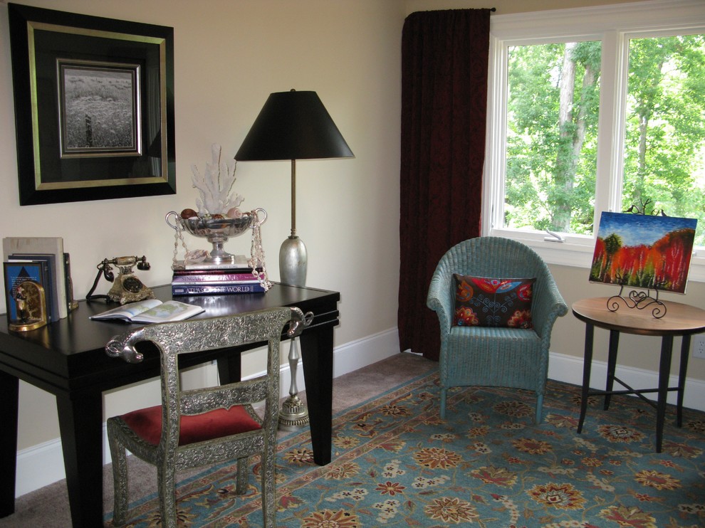 Mid-sized eclectic guest bedroom in Raleigh with beige walls, carpet, no fireplace and beige floor.