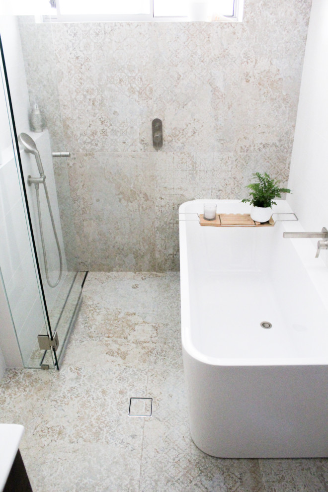 This is an example of a small bathroom in Perth with flat-panel cabinets, white cabinets, a freestanding bath, multi-coloured tiles, porcelain tiles, a vessel sink, engineered stone worktops, an open shower, white worktops, a single sink and a floating vanity unit.