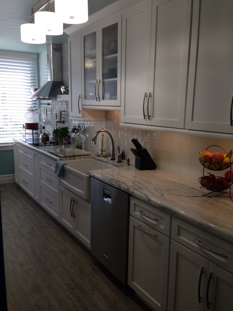 Example of a transitional kitchen design in Burlington