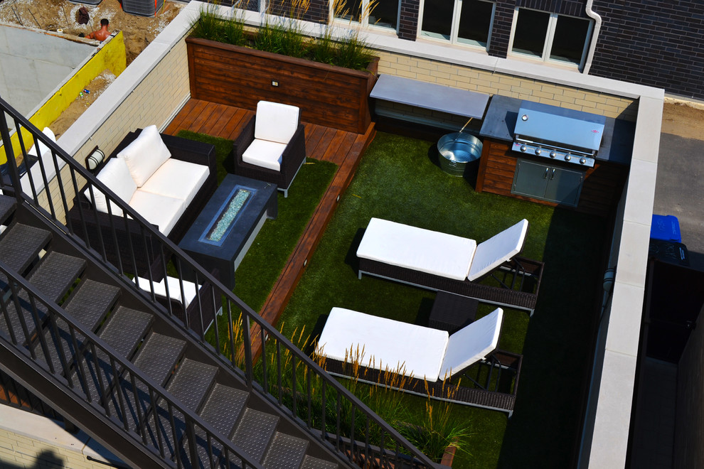 Mid-sized trendy rooftop deck photo in Chicago with a fire pit and no cover