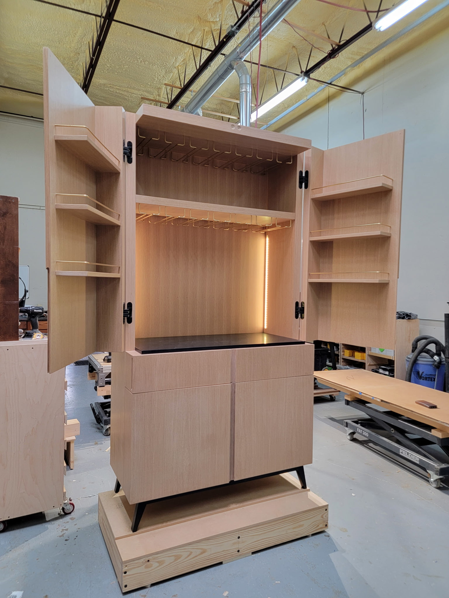 CUSTOM MODERN GLASSWARE CABINET