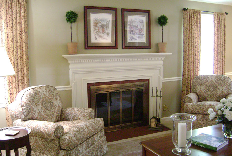 Photo of a large traditional formal open concept living room in Other with beige walls, a standard fireplace, a wood fireplace surround and no tv.