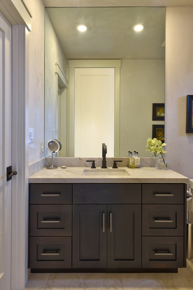 Photo of a mid-sized transitional 3/4 bathroom in San Francisco with recessed-panel cabinets, dark wood cabinets, marble benchtops, white tile, beige walls, medium hardwood floors and an undermount sink.