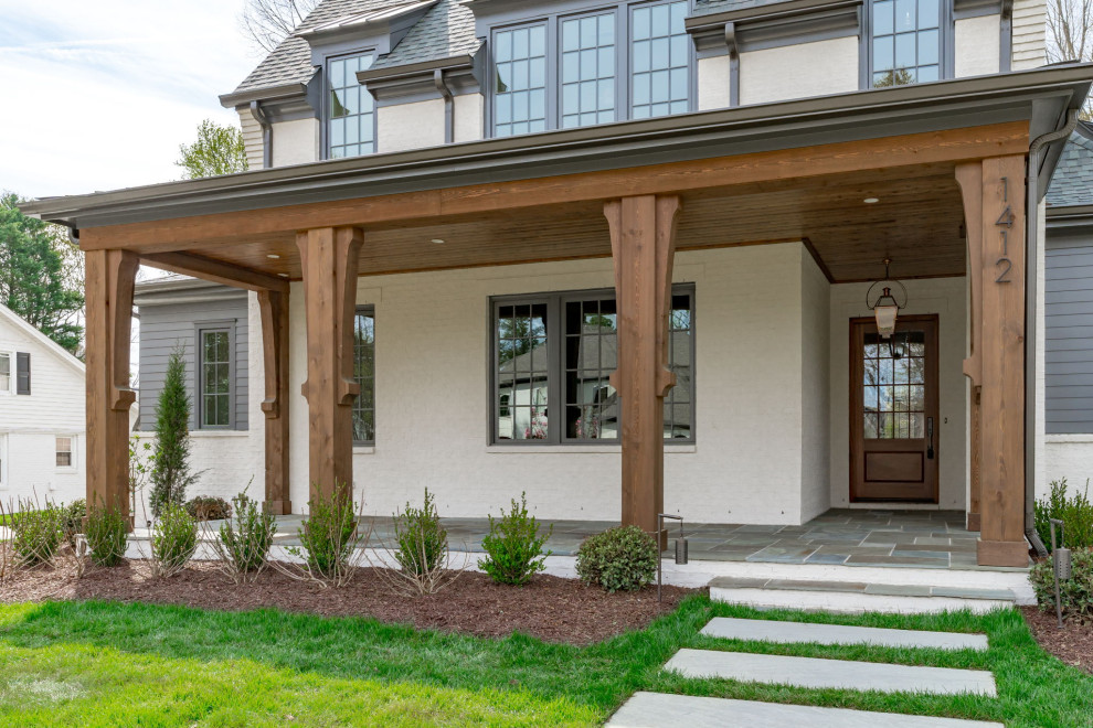 Transitional porch photo in Raleigh