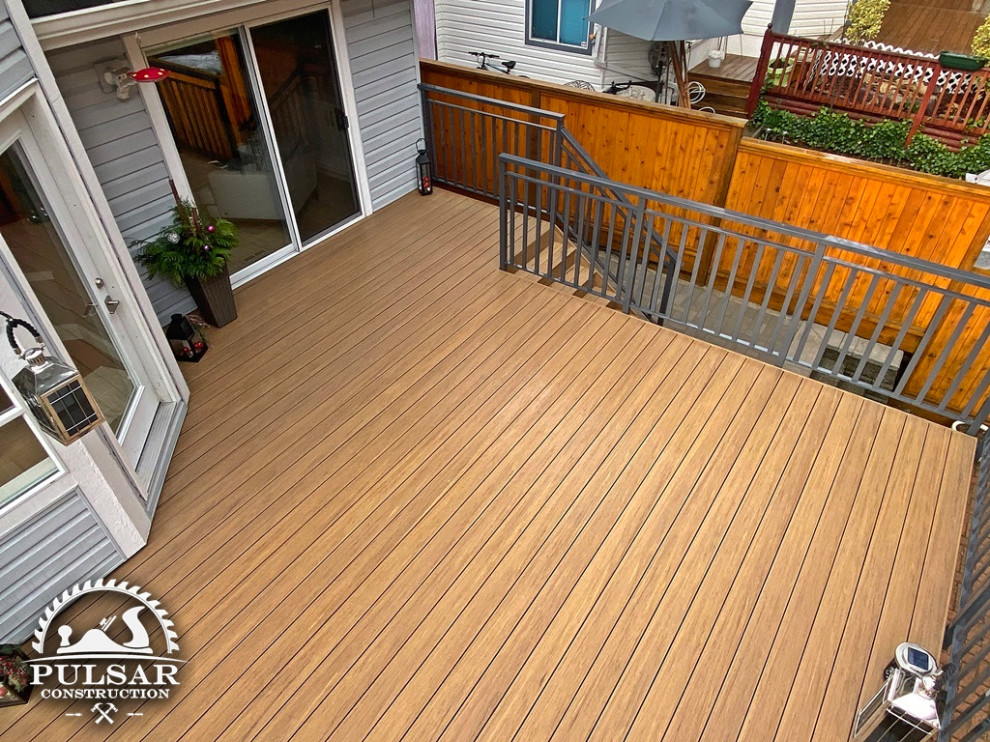 Mid-sized deck photo in Vancouver