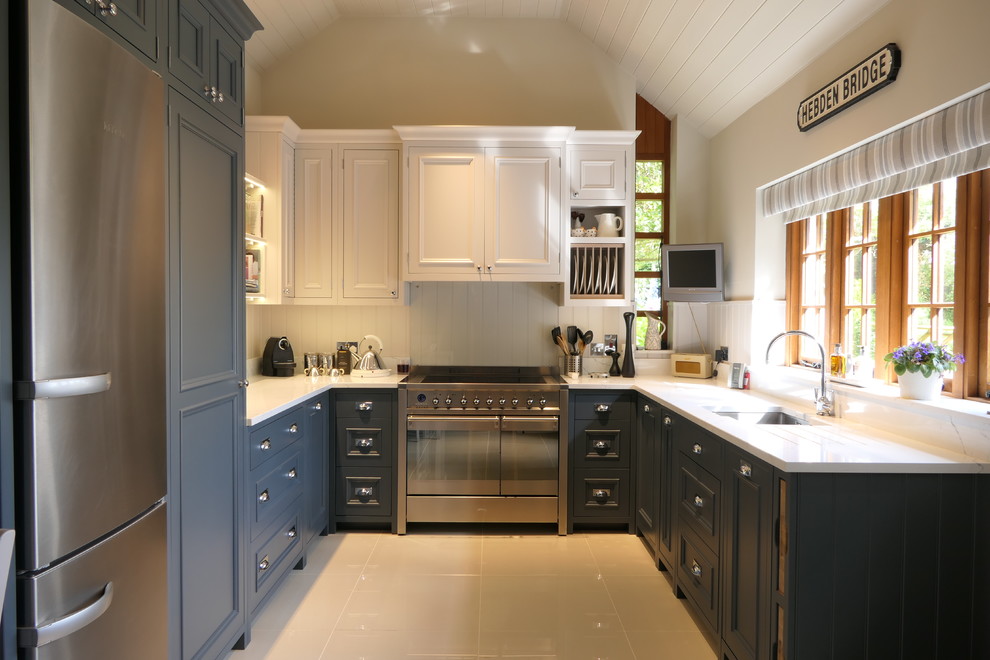 Mid-sized traditional u-shaped eat-in kitchen in Other with an integrated sink, shaker cabinets, grey cabinets, quartz benchtops, white splashback, timber splashback, stainless steel appliances, ceramic floors, no island, white floor and white benchtop.